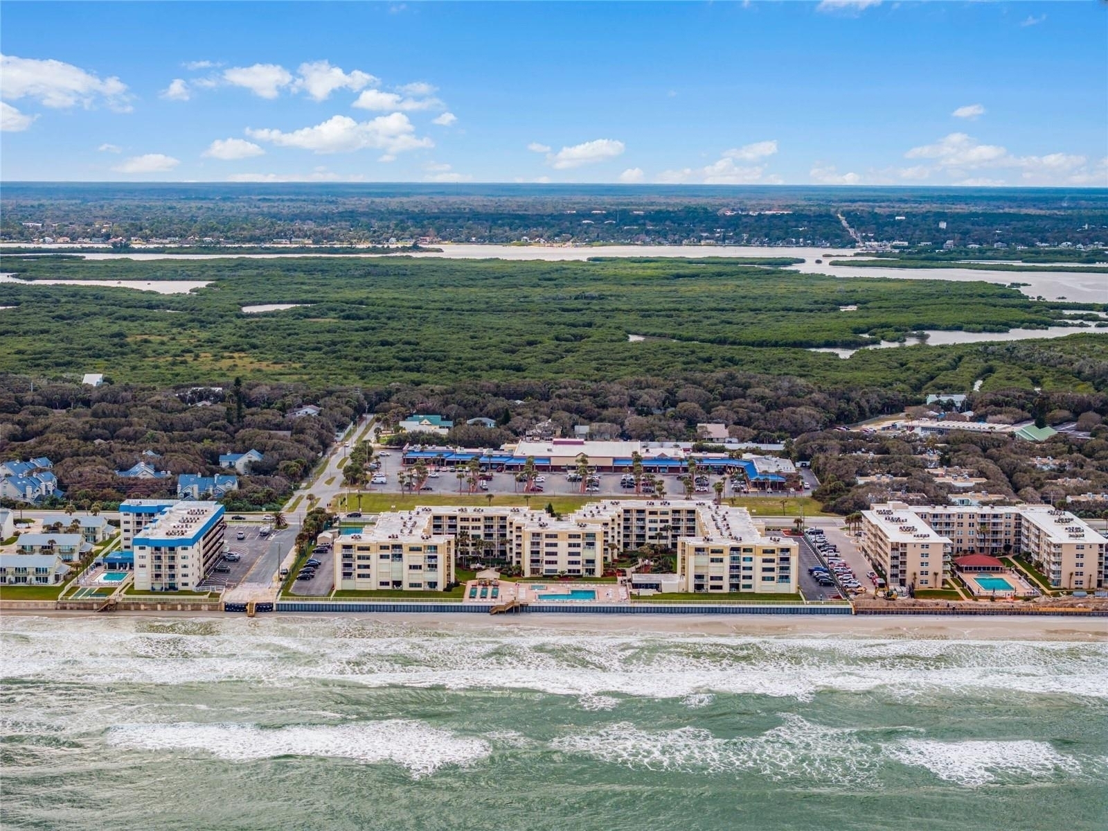 NSB Homes sells Castle Reef condos in New Smyrna Beach 386-235-8588