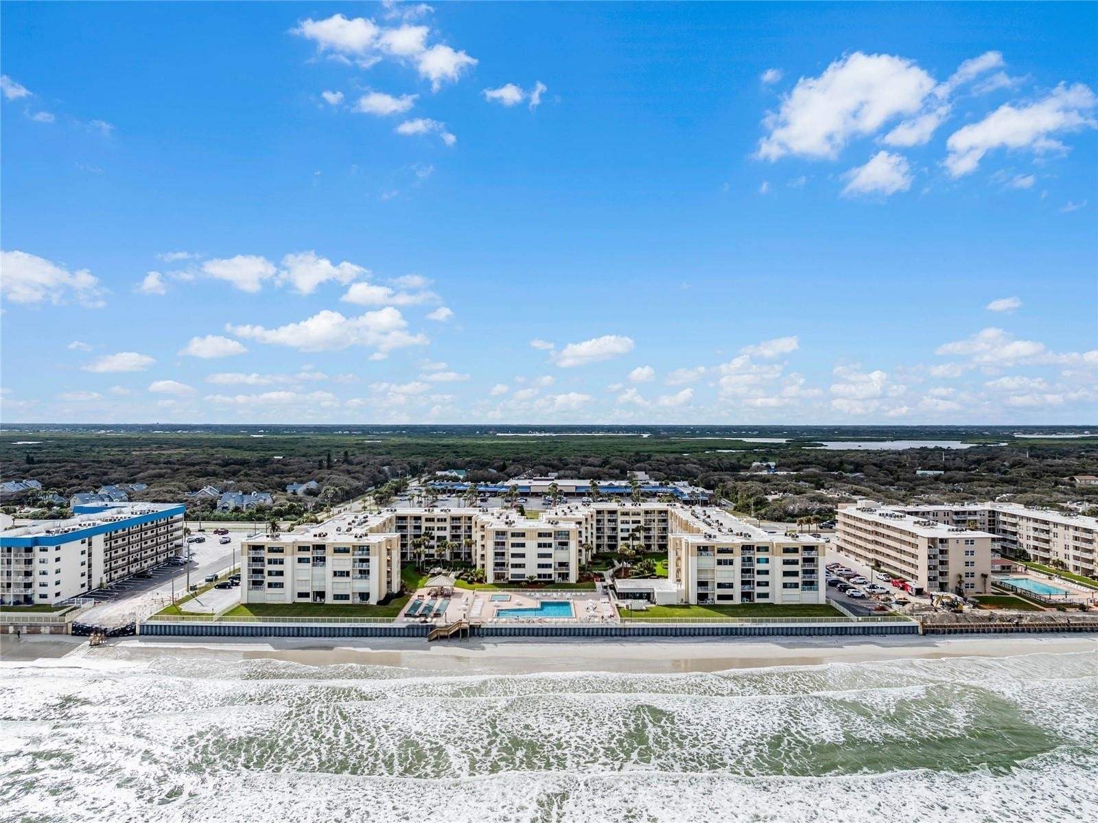 NSB Homes sells Castle Reef condos in New Smyrna Beach 386-235-8588