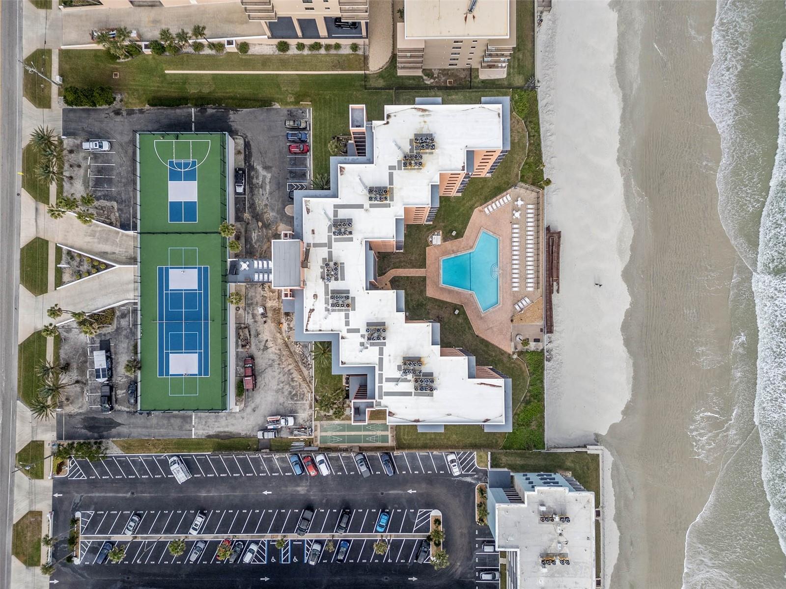 Sunrise Condos in New Smyrna Beach; call NSB Homes 386-235-8588